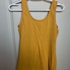 Maurice’s yellow tank-top!